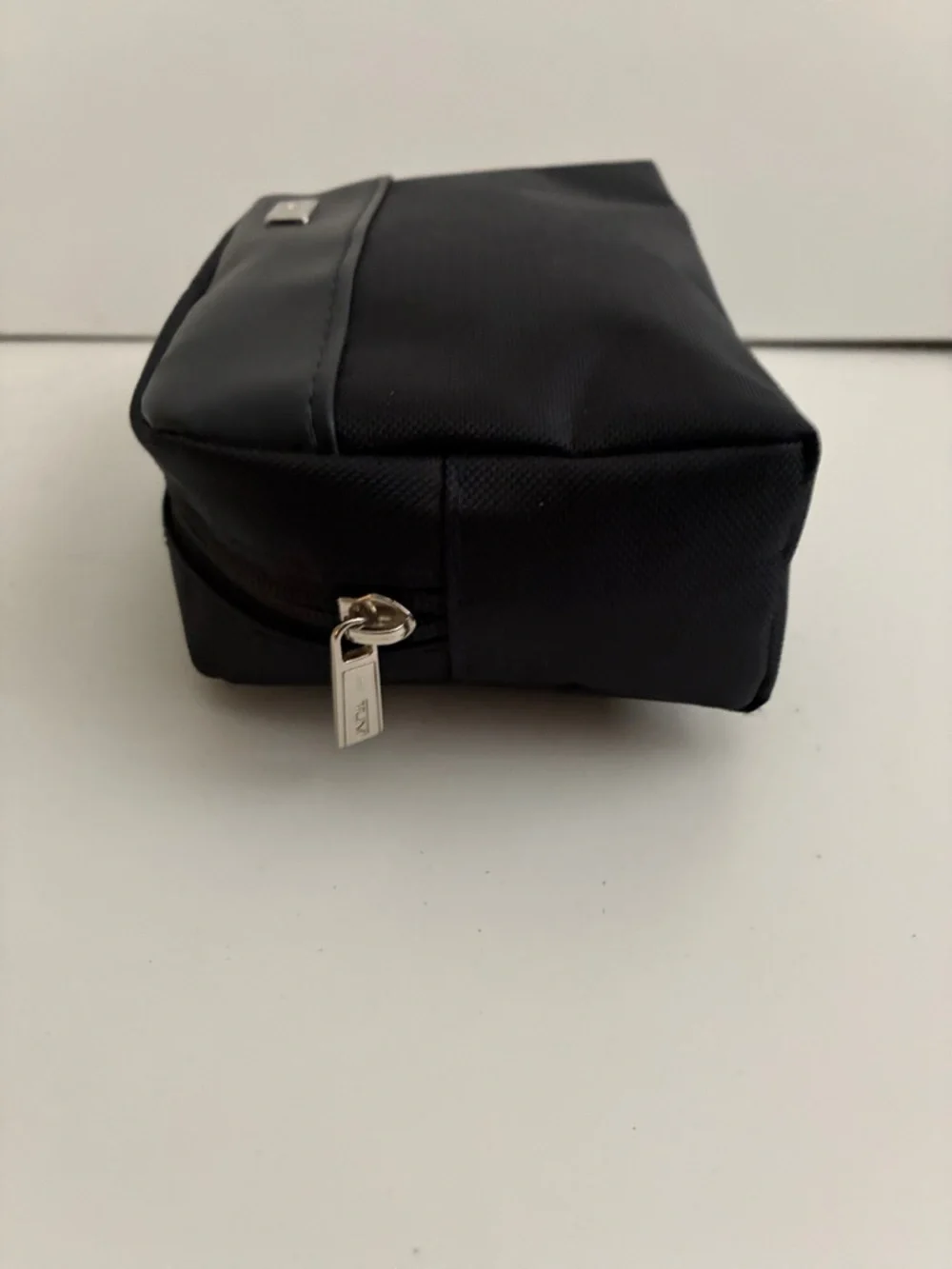Tumi Black Men's Toiletry Pouch with Gold Accent